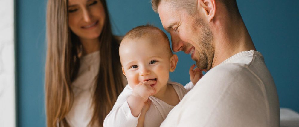 A father and mother with their baby