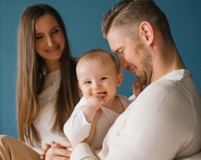 A father and mother with their baby