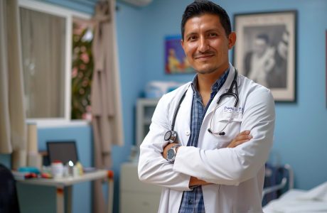 A male doctor smiling