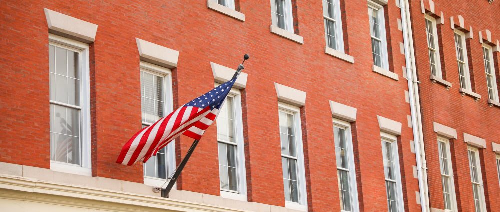 American flag planted on a building