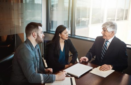 A lawyer and a couple in a meeting